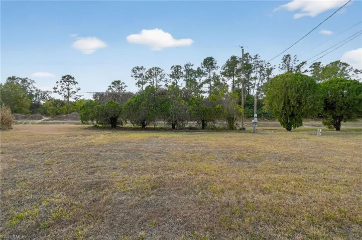 View of green lawn backing to the canal