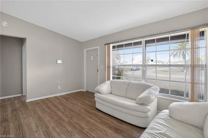 Living room with newer vinyl flooring
