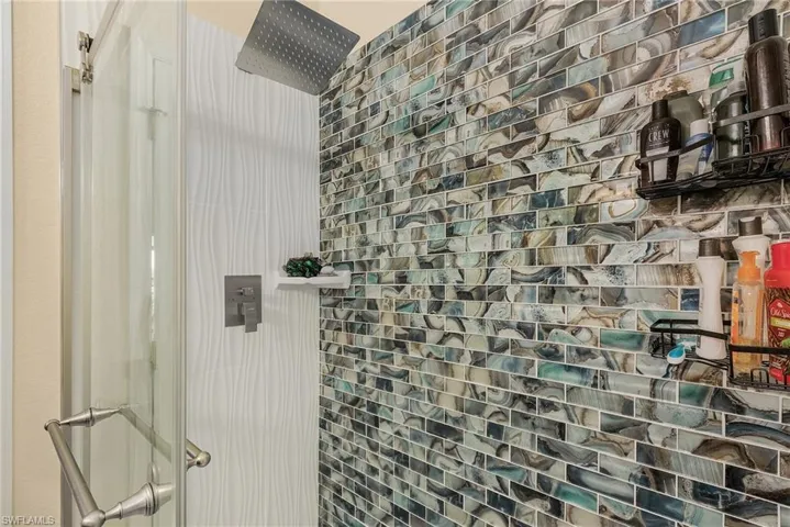 Bathroom featuring walk in shower