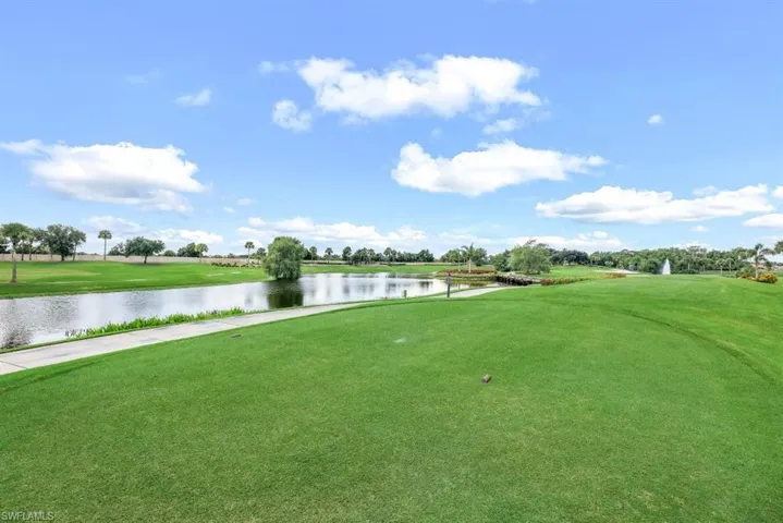 Surrounding community featuring a water view