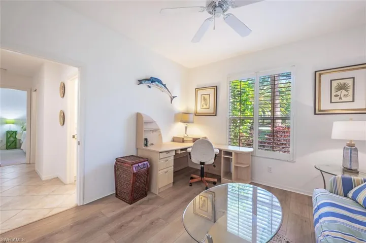 Office featuring light wood-style flooring and ceiling fan