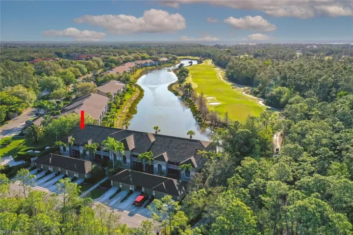 Aerial view of a nearby body of water and a golf course