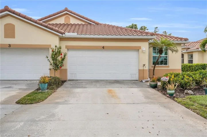 Mediterranean / spanish-style house featuring a garage