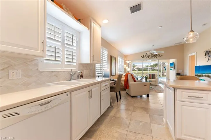 15366 Upwind Dr Bonita Springs FL 34135 - Pull out for trash and recycling.