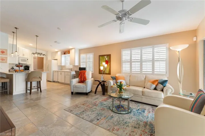 15366 Upwind Dr Bonita Springs FL 34135 - Plantation shutters throughout this home give it a finished and updated feel.