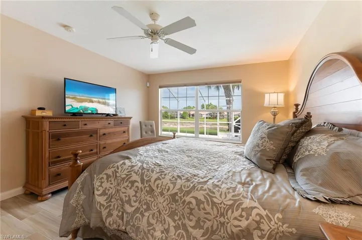 15366 Upwind Dr Bonita Springs FL 34135 - Owner's bedroom with blackout shade and pool view