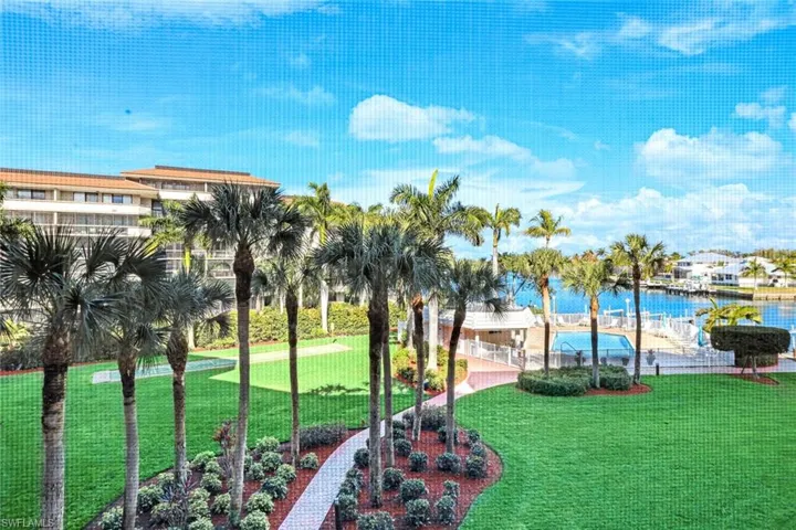 View of home's community with a water view