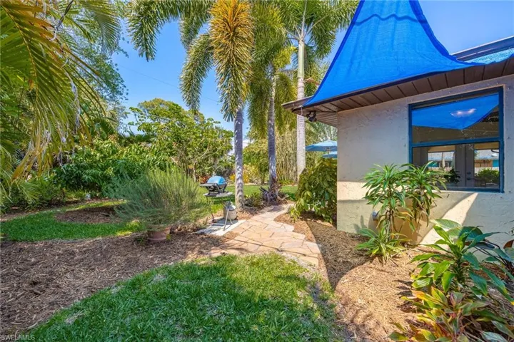 Side yard with extra exterior shade for dining room.