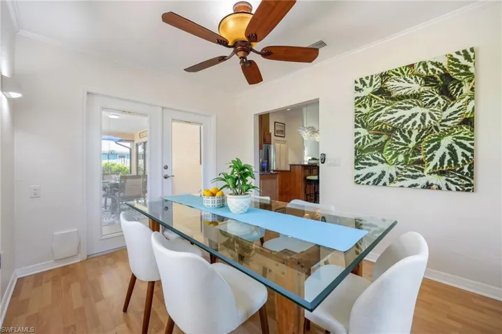 Dining area opens to screened / covered lanai.