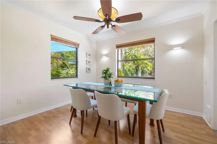 Dining space off the kitchen with great natural light. There are french doors that open to screened lanai.