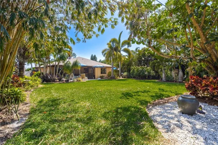 View of back yard towards the home.
