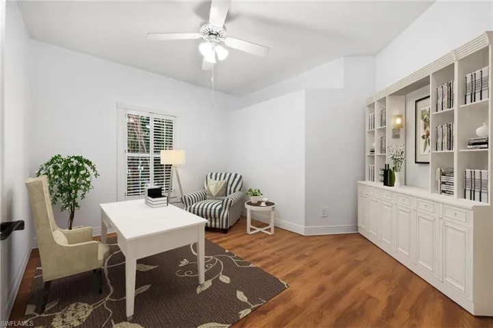 Bedroom virtually staged as an office