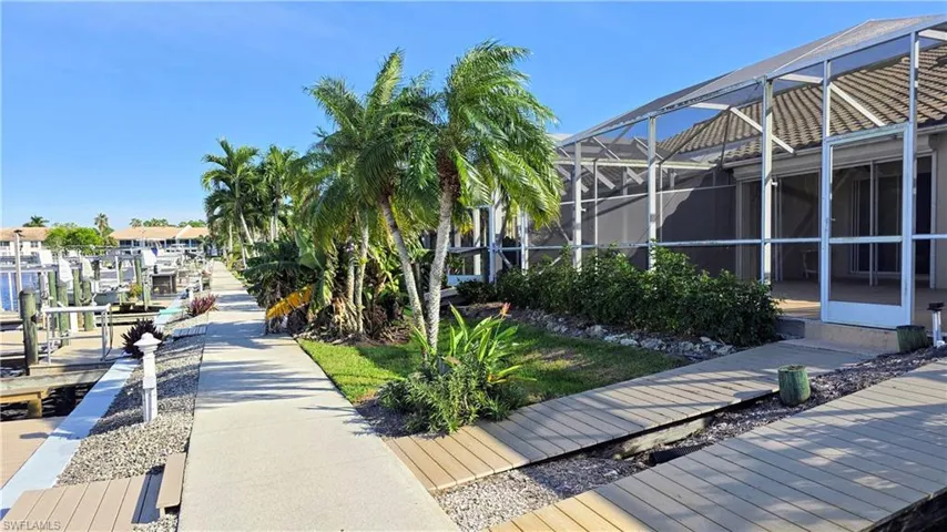 View of property's community featuring a boat dock