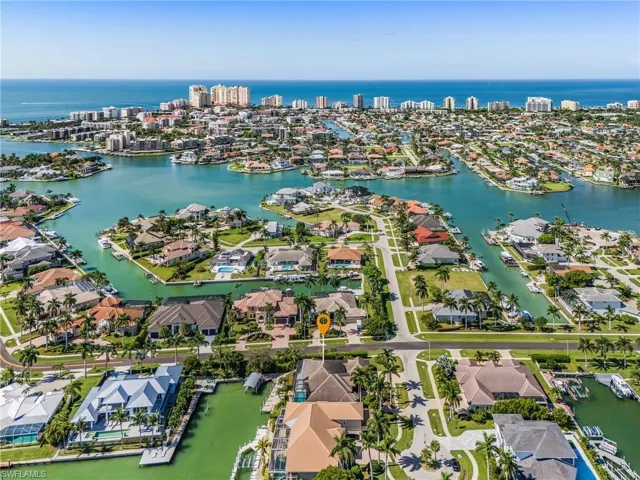 Aerial view SW towards the Gulf and Marco Island South Beach. No bridges to Gulf.