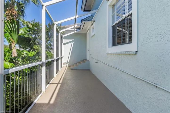 Sunroom off laundry with direct access to boats.