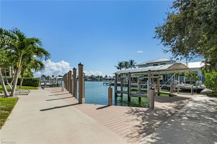 60-ft yacht slip with tide guides, electric, water, and captains walk.