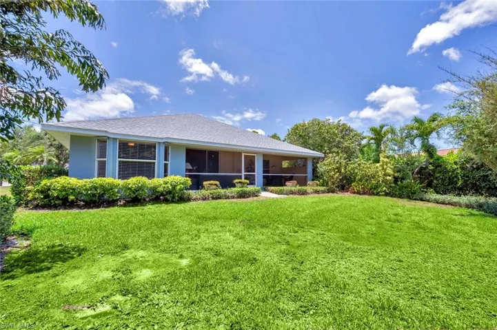 View of front of house with a front yard