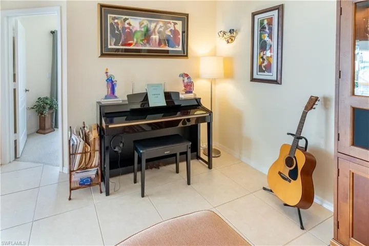 Sitting room with light tile patterned floors