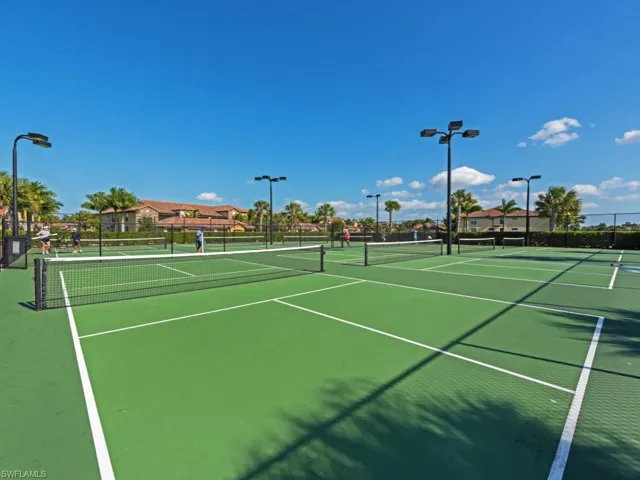 View of sport court with fence and community basketball court