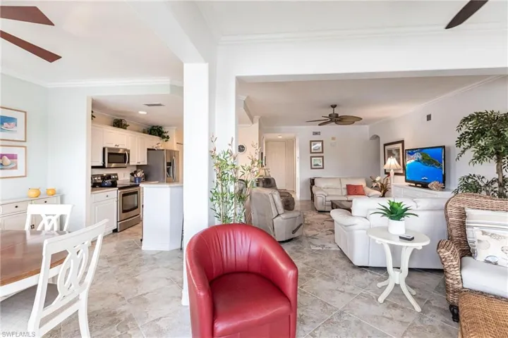 Living room adjacent to open kitchen