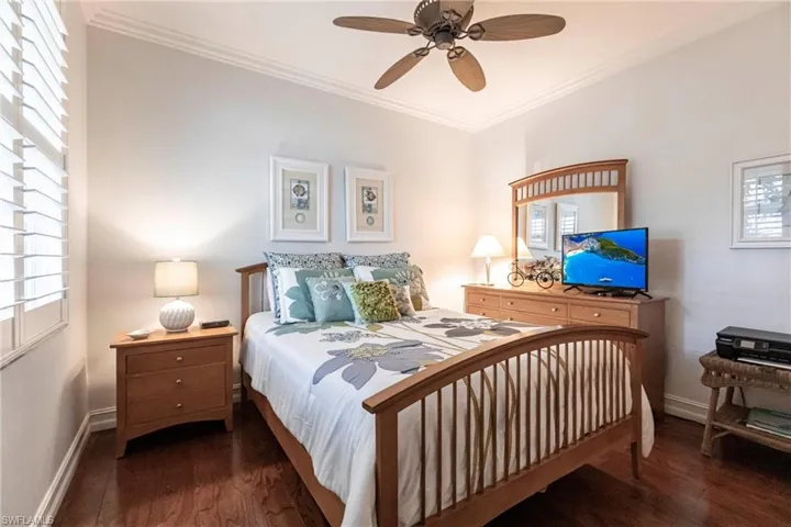 Guest Bedroom featuring Elm wood flooring