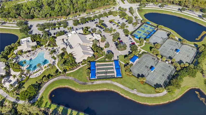 Aerial view of property's location featuring a large body of water