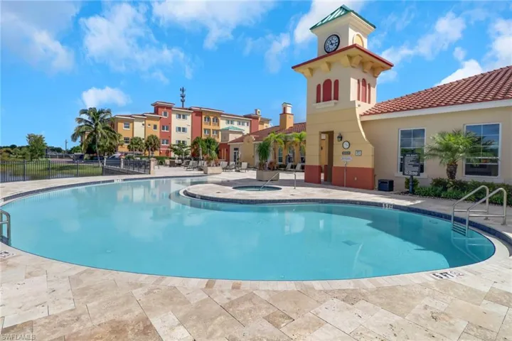 Community pool with a patio area