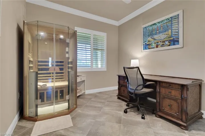 Home office with a sauna / steam room and ornamental molding