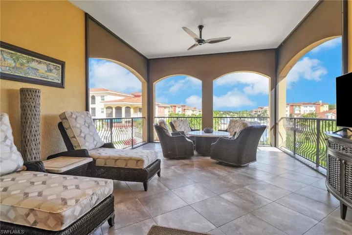 View of patio with a ceiling fan