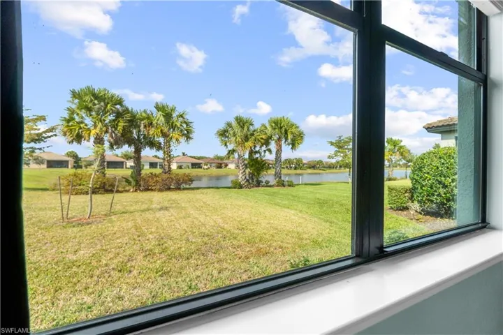 Imagine waking up to this amazing view!!! Master Bedroom Window. 16009 Palmetto Prairie Drive.  Hampton Lakes at River Hall.