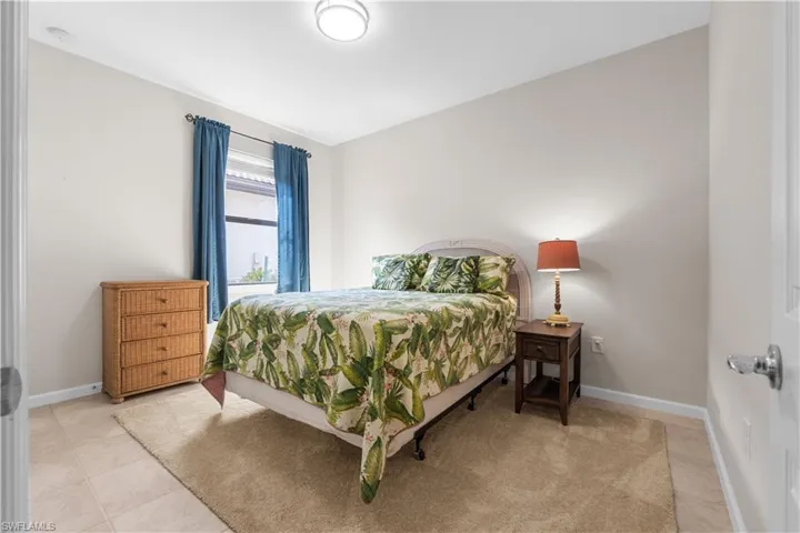 Guest Bedroom 2.  16009 Palmetto Prairie Drive.  Hampton Lakes at River Hall.