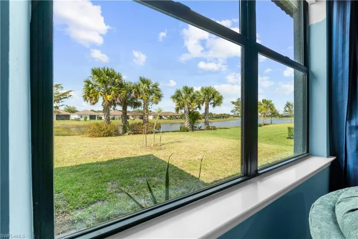 Amazing View from the Living/Great room of the yard and large lake. 16009 Palmetto Prairie Drive.  Hampton Lakes at River Hall.