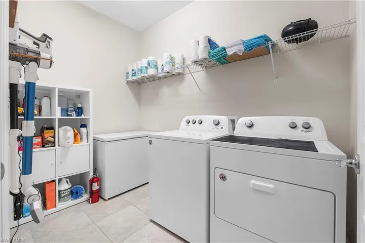 Large Laundry/Storage room.  16009 Palmetto Prairie Drive.  Hampton Lakes at River Hall.