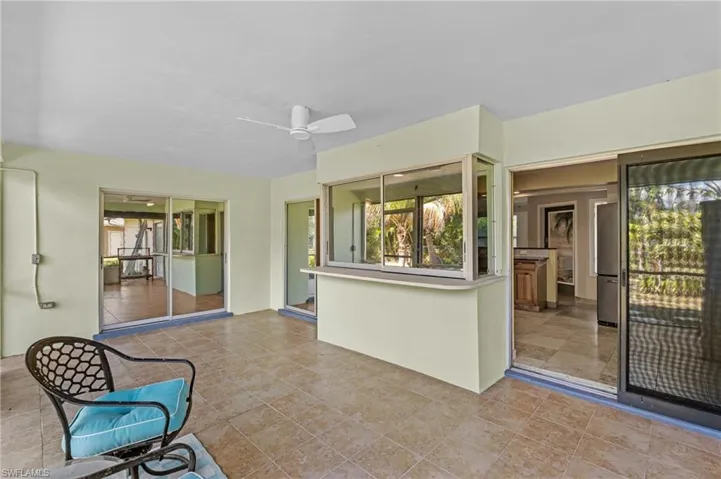 View of patio featuring ceiling fan