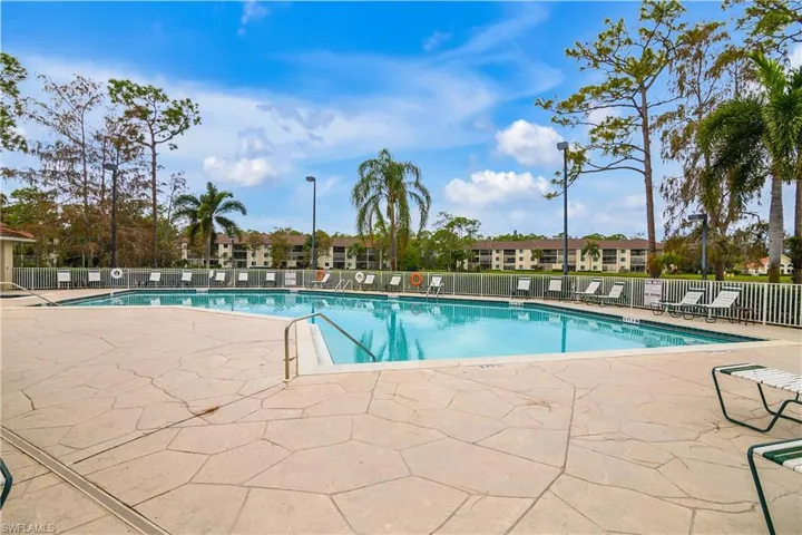 View of main pool featuring a patio