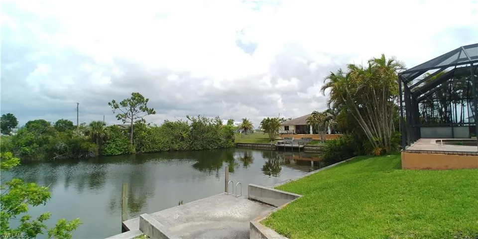 Neighbors dock across the canal from lot
