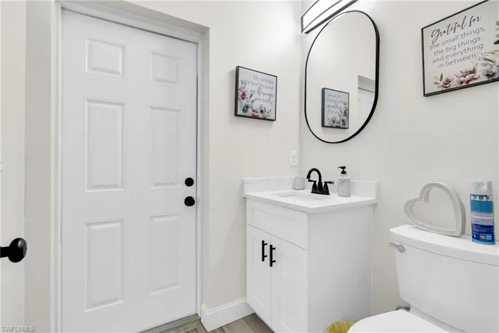Bathroom with vanity and toilet