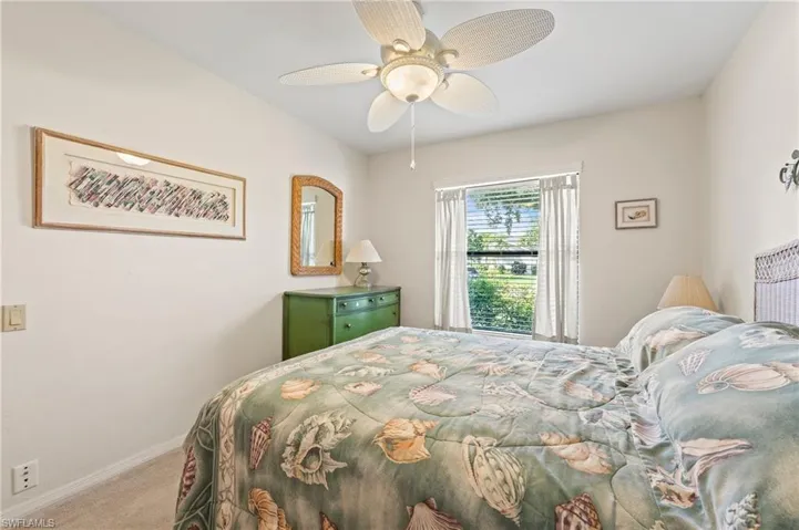 Bedroom with carpet floors and ceiling fan