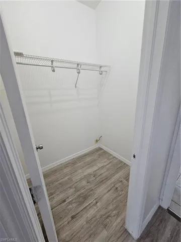 Washroom featuring hardwood / wood-style floors