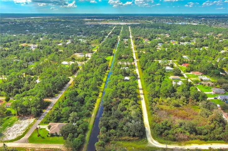 Aerial view of property and surrounding area