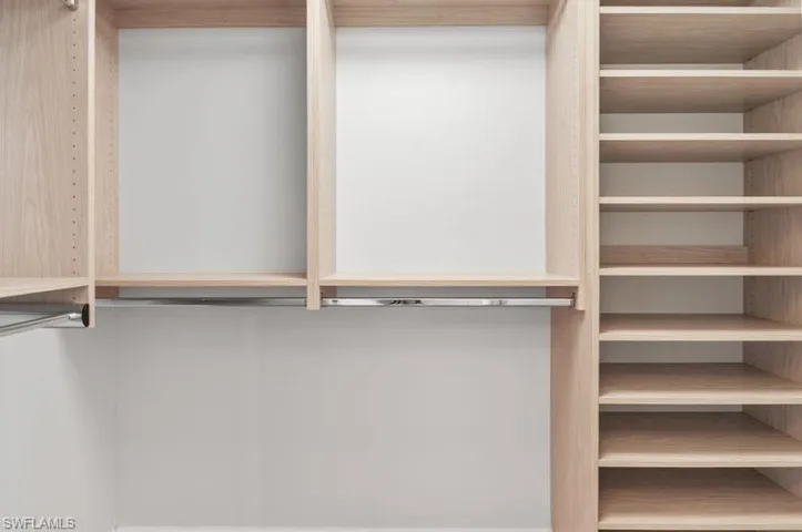 One of 2 master closets