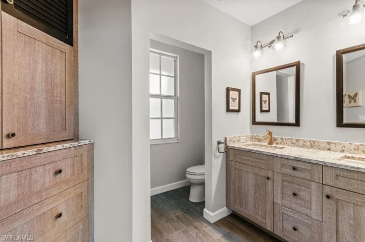 master bath with wall of built-ins