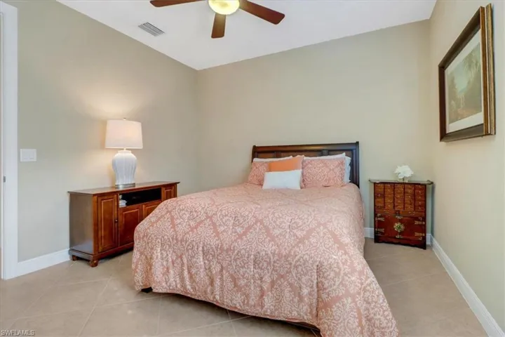 Bedroom featuring ceiling fan and light tile patterned floors