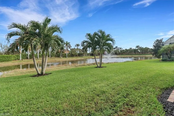 View of yard with a water view