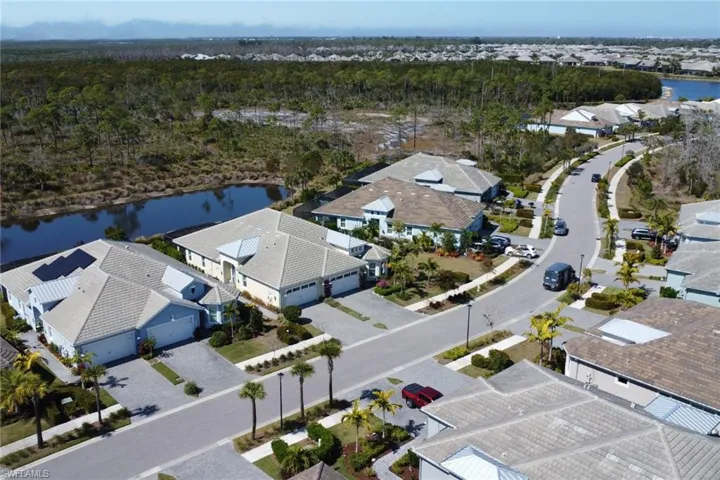 Aerial view of residential area with a large body of water