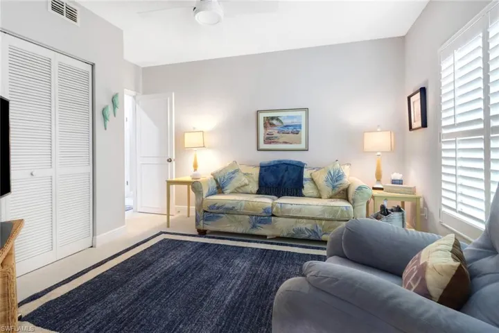 Comfortable den with ceiling fan
