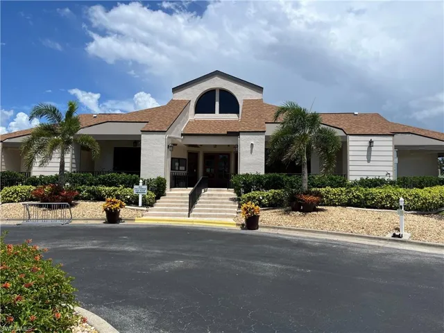 Mediterranean / spanish house featuring stucco siding and french doors