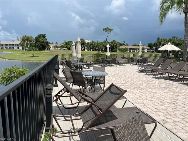 View of patio / terrace with a water view