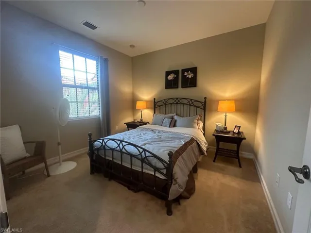 Bedroom with carpet floors