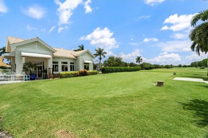 View of yard featuring view of golf course